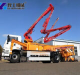 Boom truck delivering concrete