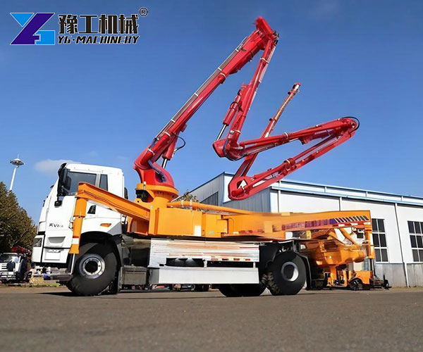 Boom truck delivering concrete