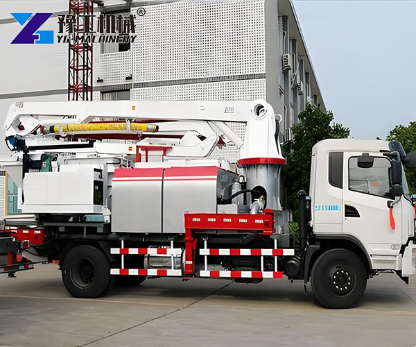 Concrete boom truck on site