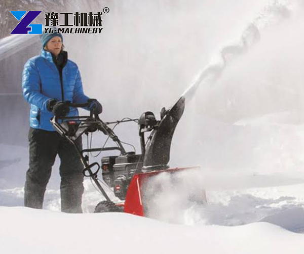 Removal snow machine in use