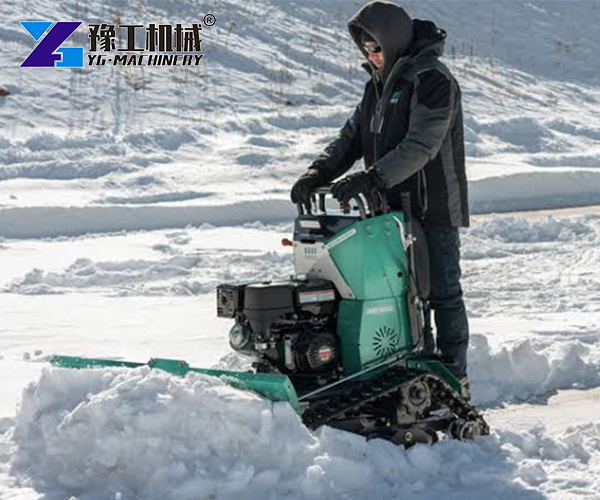 Sidewalk snow-clearing equipment in operation