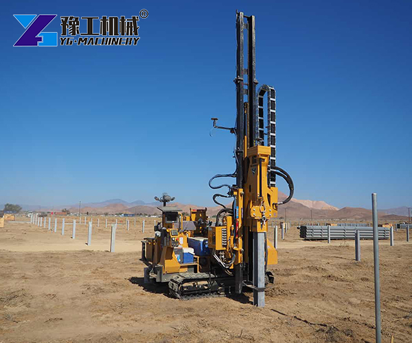 Solar post driver working on site